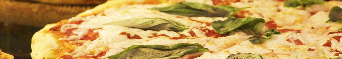 Eating Italian Pizza at Strada Italiano restaurant in Asheville, NC.